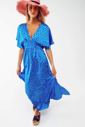 Abito lungo a vita cinched e maniche a farfalla a pois blu