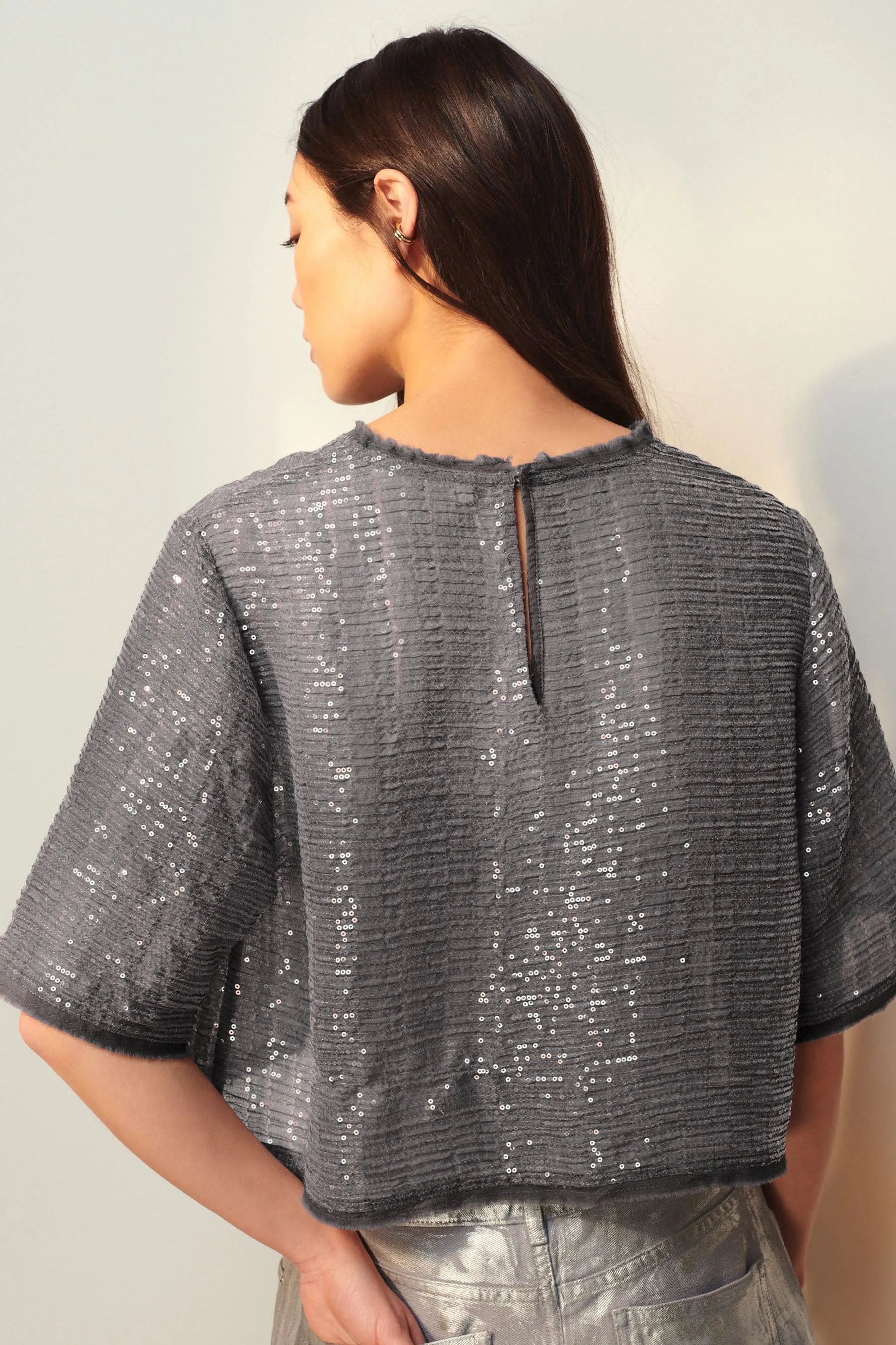 T-shirt a maniche corte con paillettes